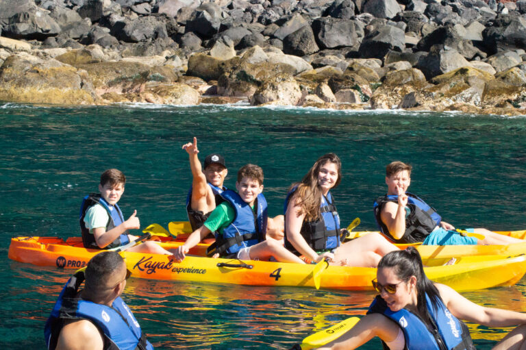 Close up of a Group of Friends Kayaking at the Ponta de São Lourenço coast, a kayaking experience by Madeira Sea Emotions.