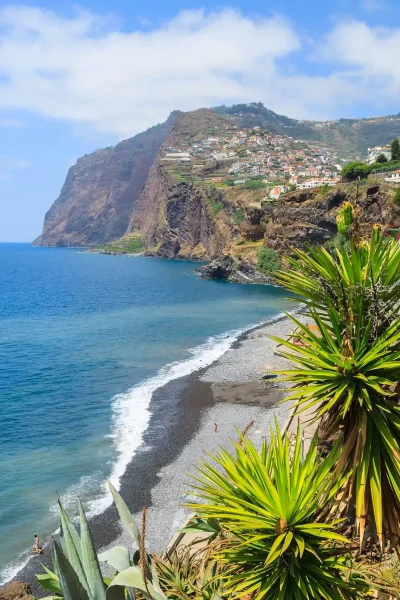 Coastal promenade along ocean to Camara de lobos, one of the views of the Hop-on Hop-off Bus experience by Carristur
