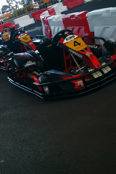 Two karts on the racing track located beneath Madeira Airport, the Go Kart Madeira location.