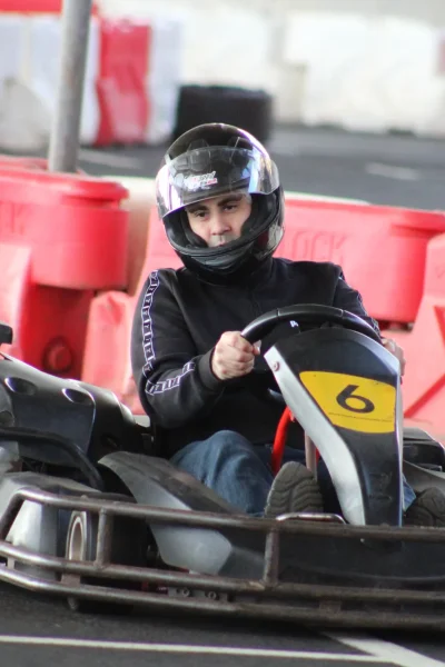 A men driving on a karting race, under Madeira Airport, an experience by Go Kart Madeira