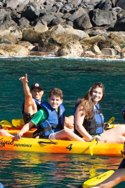 Close up of a Group of Friends Kayaking at the Ponta de São Lourenço coast, a kayaking experience by Madeira Sea Emotions.
