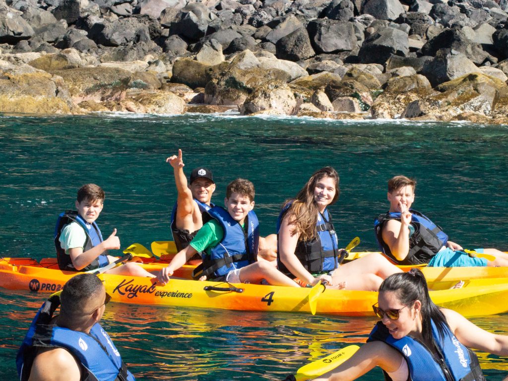 Close up of a Group of Friends Kayaking at the Ponta de São Lourenço coast, a kayaking experience by Madeira Sea Emotions.