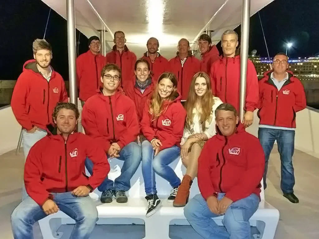 VMT Madeira team posing in a catamaran