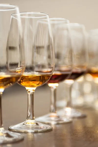 Row of Madeira wine glasses prepared for a tasting, an experience by Wine Tours Madeira